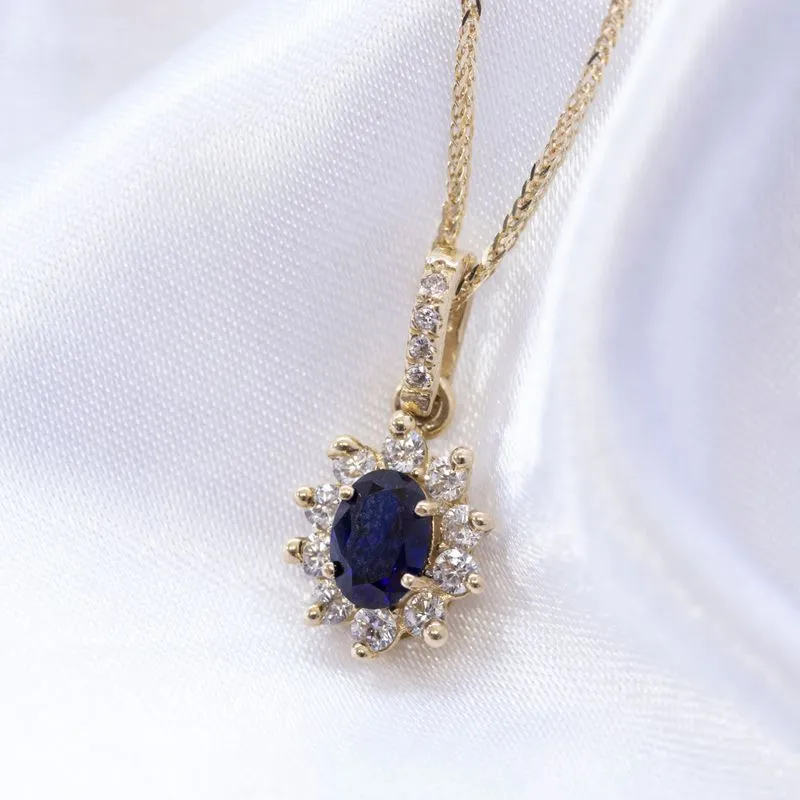 14K Yellow Gold Oval Blue Cubic Zirconia 7X5mm Pendant